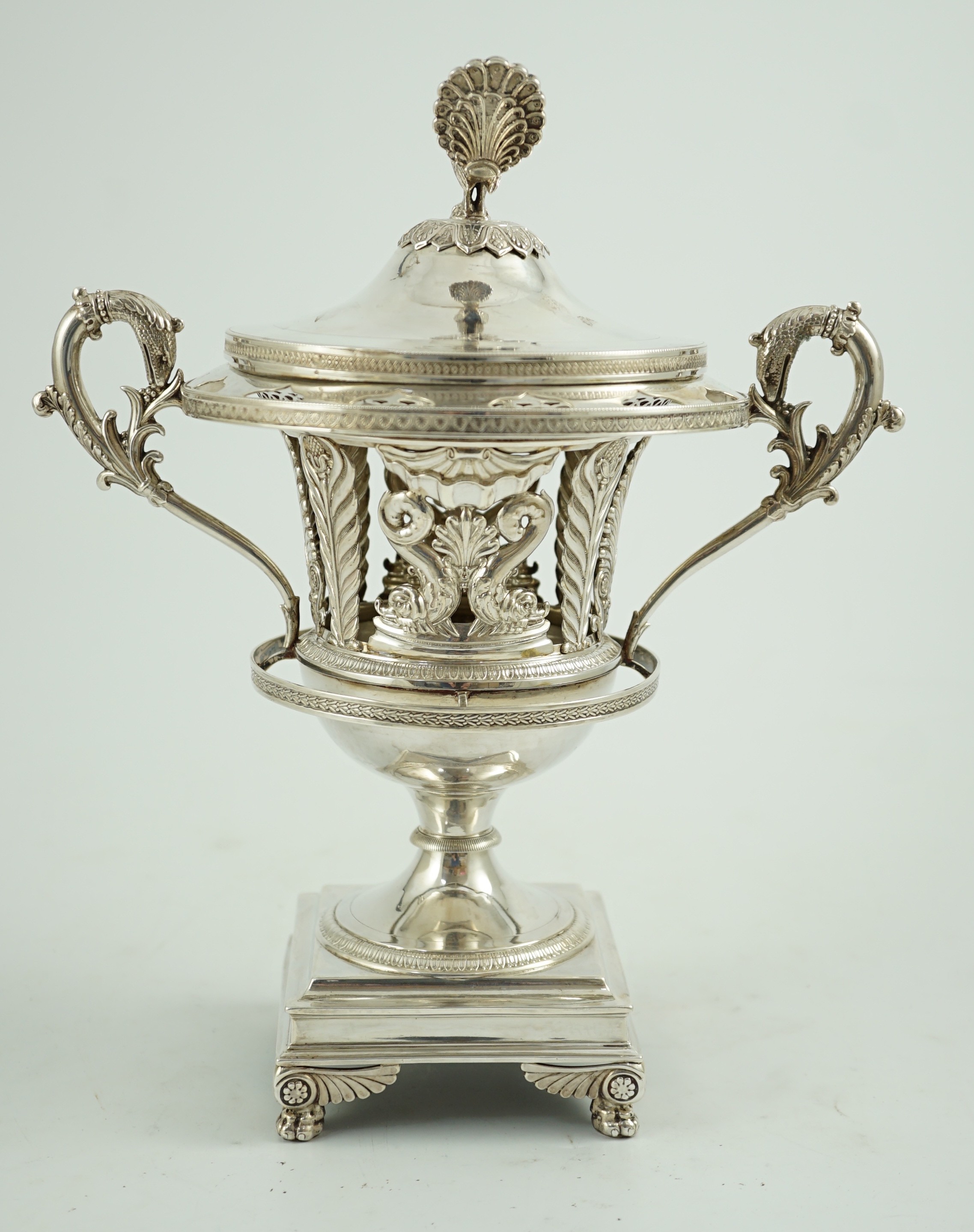 A 19th century ornate French pierced silver two handled urn shaped vase and cover